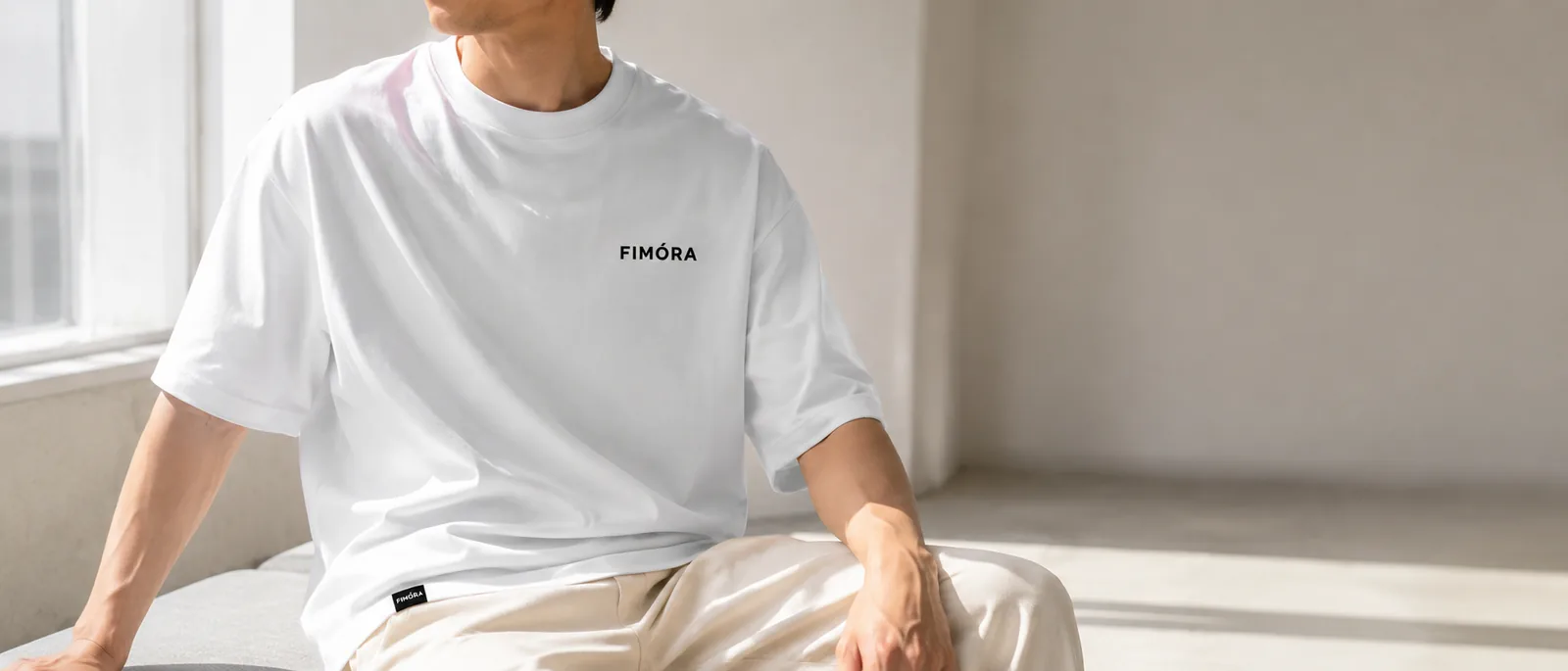 FIMÓRA white oversized tee on male model