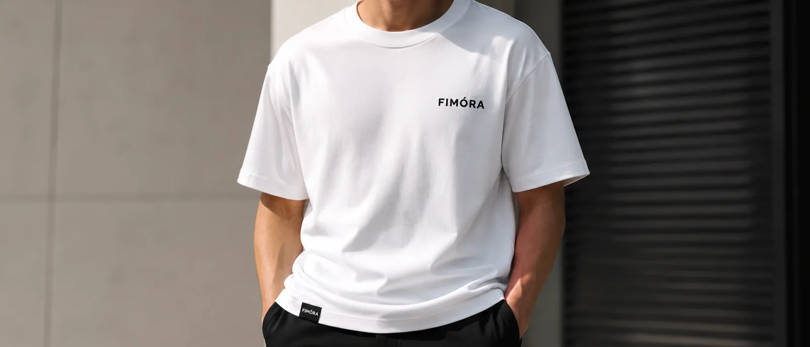 Close-up of FIMÓRA white T-shirt texture and logo